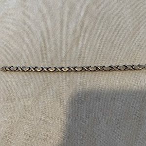 Sterling Silver diamond cut bracelet. 7”
